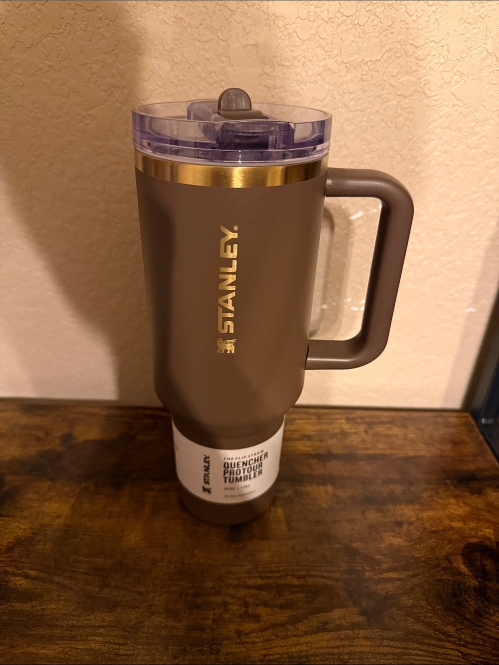 Stanley 40oz Brown Travel Mug with Gold Trim and Clear Lid